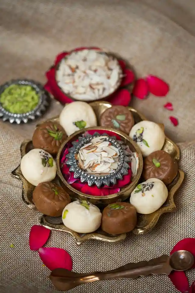 Mithai shop counter - showing variety of sweets and snacks.